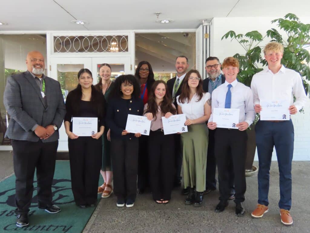 students at lakewood rotary club meeting